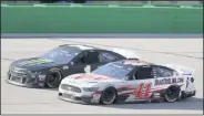  ?? MARK HUMPHREY - THE ASSOCIATED PRESS ?? Kurt Busch (1) and Cole Custer (41) work during a NASCAR Cup Series auto race Sunday, July 12, 2020, in Sparta, Ky.