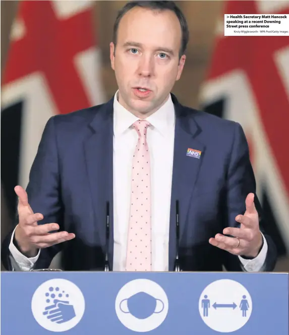  ?? Kirsty Wiggleswor­th - WPA Pool/Getty Images ?? Health Secretary Matt Hancock speaking at a recent Downing Street press conference