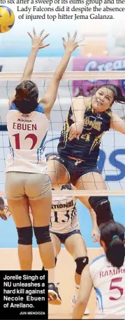  ?? JUN MENDOZA ?? Jorelle Singh of NU unleashes a hard kill against Necole Ebuen of Arellano.