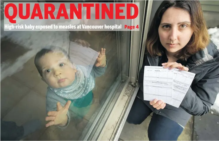  ?? ARLEN REDEKOP/PNG ?? Stefania Seccia with baby Max, 1, who is quarantine­d due to a measles scare, in Burnaby Monday. The notes show Stefania and her husband Sam have been vaccinated.