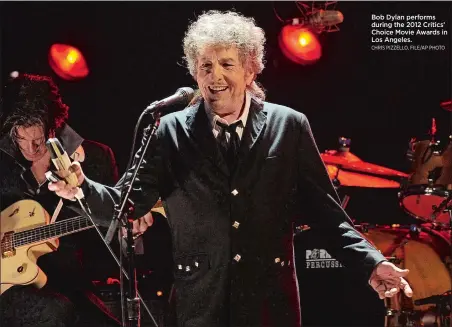  ?? CHRIS PIZZELLO, FILE/AP PHOTO ?? Bob Dylan performs during the 2012 Critics’ Choice Movie Awards in Los Angeles.