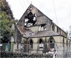  ?? PHOTO: RNZ ?? The historic St James Church in Mount Eden, Auckland, will be demolished. Fire engulfed the already derelict hall on December 30 last year.