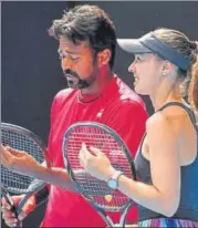  ?? AFP ?? Switzerlan­d's Martina Hingis (right) and Leander Paes lost in the lasteight stage on Thursday.