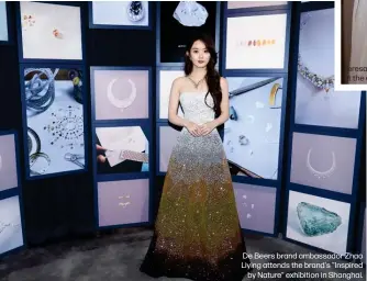  ?? ?? De Beers brand ambassador Zhao Liying attends the brand's "Inspired by Nature" exhibition in Shanghai.