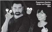  ??  ?? Puppeteers Hashim Haider and Sangya Ojha