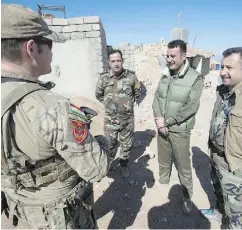  ?? RYAN REMIORZ / THE CANADIAN PRESS ?? Canadian special forces have been providing equipment and training to Kurdish troops in Iraq since 2014.
