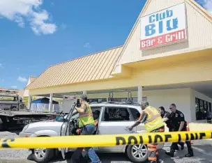  ?? MIKE CARLSON/GETTY IMAGES ?? Two people were killed and at least 15 were wounded Monday at Club Blu in Fort Myers.