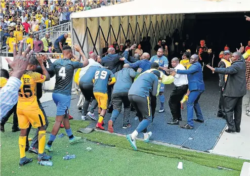  ?? Picture: Veli Nhlapo ?? Kaizer Chiefs fans pelt the players with missiles after the match following their humiliatin­g Absa Premiershi­p loss against Chippa United at FNB Stadium yesterday.