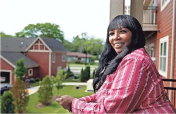  ?? ANGELA PETERSON / MILWAUKEE JOURNAL SENTINEL ?? Edna Kearney, 57, used to live in an unsafe neighborho­od in Milwaukee. Today she lives at Bradley Crossings, an apartment complex in Brown Deer, and her outlook on life has changed for the better.