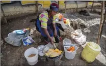  ?? KHALIL SENOSI — THE ASSOCIATED PRESS ?? A woman fries potatoes in Nairobi, Kenya. Global cooking oil prices have been rising since the COVID-19 pandemic began, and Russia's war in Ukraine has sent costs spiraling four times higher.