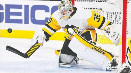  ?? STEPHEN R. SYLVANIE/USA TODAY SPORTS ?? Pittsburgh Penguins goaltender Tristan Jarry has taken over as the team’s regular starter thanks to his terrific first-half numbers.