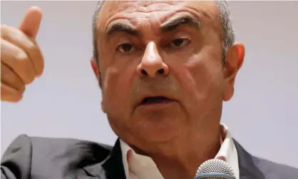  ?? Photograph: Anwar Amro/AFP/Getty Images ?? Carlos Ghosn pictured in 2020. As he awaited trial in December 2019, Ghosn staged an audacious getaway, smuggled out of Japan in an audio equipment case on a private jet.