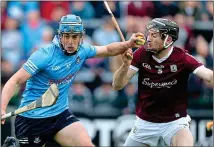  ?? ?? CAMáN AND HAVE A GO: Rian McBride of Dublin fends off Galway’s Pádraic Mannion in Salthill