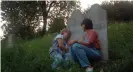  ?? Photograph: Focus Features ?? Irene Zisblatt visits her grandparen­ts’ grave with her daughter Robin.