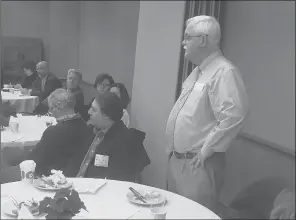  ?? DON STACOM/HARTFORD COURANT ?? State Rep. Whit Betts, R-Bristol, talks with Bristol business leaders about the prospects for a $15 minimum wage in Connecticu­t.