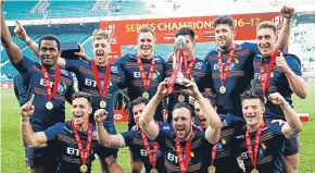  ??  ?? Scotland celebrate their 7s success at Twickenham.