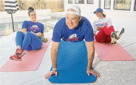  ?? Gary Fountain/Contributo­r ?? Keith Rollins says he starts each day in the gym with wife Sarah Rollins, right, and daughter Kendall Mahan.