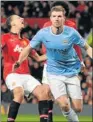  ?? Picture: AFP ?? ON TARGET: Manchester City's Edin Dzeko celebrates after scoring the second goal during their match against Manchester United