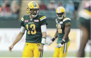  ?? IAN KUCERAK ?? Edmonton’s Mike Reilly calls a play during a CFL game between the Edmonton Eskimos and the Ottawa Redblacks at the Brick Field at Commonweal­th Stadium on June 25.