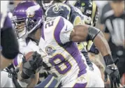  ??  ?? Minnesota Vikings running back Adrian Peterson is averaging 129.4 yards per game this season, but 162.4 over the past eight games.