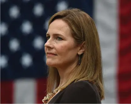  ?? Photograph: Olivier Douliery/AFP/Getty Images ?? Amy Coney Barrett. ‘Adding one more conservati­ve justice gives all the conservati­ve justices more fuel to be more political in what they’re going to do,’ says an attorney.