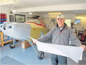  ??  ?? FLAT-PACK: Former RAF pilot Peter Gilmour is building an aeroplane in his garage.