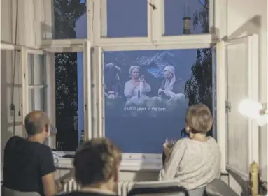  ??  ?? 0 A Berlin family watch a film projected on to a neighbouri­ng building, left, as part of the Windowflic­ks project. Top right: The Illusionis­t and, right, John Gordon Sinclair in Gregory’s Girl, from 1981