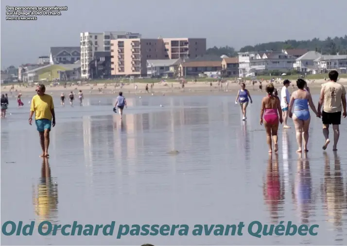  ?? PHOTO D’ARCHIVES ?? Des personnes se promènent sur la plage à Old Orchard.