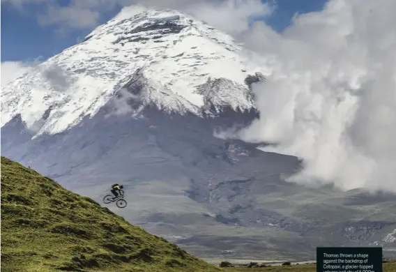  ??  ?? Thomas throws a shape against the backdrop of Cotopaxi, a glacier-topped volcano just shy of 6,000m