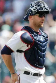  ?? (Photo by Jim Mone, AP) ?? Minnesota Twins' Chris Gimenez heads for the dugout after the Twins beat the Seattle Mariners 6-2 on Thursday.