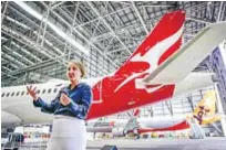  ?? AFPPIC ?? Hudson speaking to the presss as she stands in front of a Qantas Airbus A220 at Kingsford Smith Airport in Sydney yesterday. –