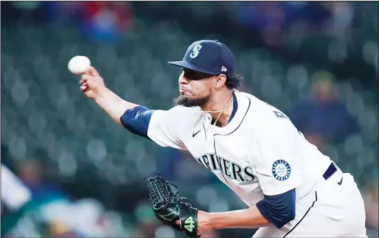  ?? (AP) ?? Seattle Mariners relief pitcher Yohan Ramirez throws against the Oakland Athletics in the eighth inning of a baseball game, on Sept. 27, in Seattle.