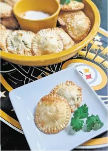  ?? GRETCHEN MCKAY Pittsburgh Post-Gazette file ?? Buffalo chicken empanadas have all the flavor of the popular dip but are handheld for easy noshing.