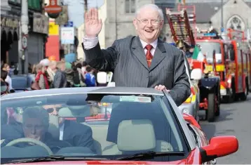  ??  ?? Right, Jimmy Magee as Grand Marshal of the St. Patrick’s Day parade in Dundalk in 2009.