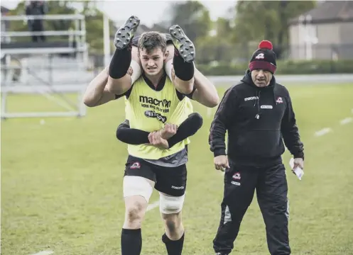  ??  ?? 0 Magnus Bradbury is put through his paces yesterday as Edinburgh train ahead of tomorrow’s clash with Munster.