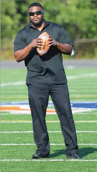  ?? Photo by Ernest A. Brown ?? Former NFL fullback Patrick Pass has taking a liking to his role as defensive coordinato­r of the Woonsocket High football team.