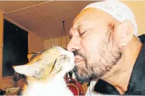  ??  ?? GOING MOGGIE: Yousuf Deedat with one of his eight cats. They have vanished and Deedat says a magistrate caused their deaths