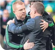  ??  ?? Neil Lennon with Brendan Rodgers a fortnight ago