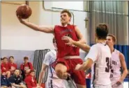  ?? DIGITAL FIRST MEDIA FILE ?? Neshaminy’s Chris Arcidiacon­o rises up for a basket during a game last season against Pennridge. Arcidiacon­o, who is second on the Redskins’ all-time scorers’ list, is doing a fifth year at Perkiomen School this winter.