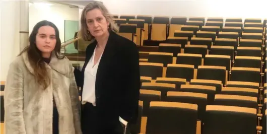  ??  ?? Called off: Former Home Secretary Amber Rudd with student Felicity Graham in the deserted lecture hall last night