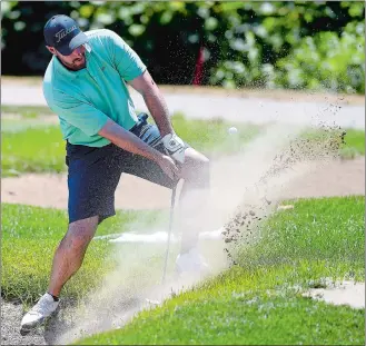  ?? SARAH GORDON/THE DAY ?? Josh Cameron hits out of a sand trap on the second hole during the championsh­ip flight final of the Norwich Invitation­al on Sunday at the Norwich Golf Course.