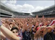  ?? THE ASSOCIATED PRESS ?? FILE - In this file photo, fans cheer for the United States against Belgium during a Brazil 2014World Cup viewing party at Soldier Field in Chicago.