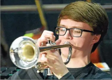  ?? BOB RAINES — DIGITAL FIRST MEDIA ?? Josh Weckerly rehearses a solo from “April in Paris” for the New Orleans Jazz Fest.