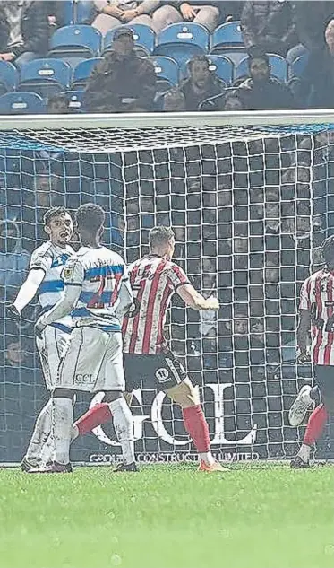  ?? ?? Luke O’Nien (hidden right) puts Sunderland ahead against QPR after a keeper blunder.