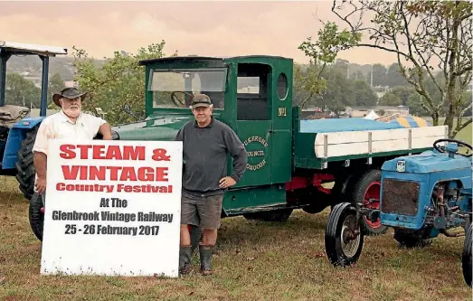  ??  ?? Ian Robb, left, and Owen Blackbourn rounding up equipment for the Steam and Country Vintage Festival.