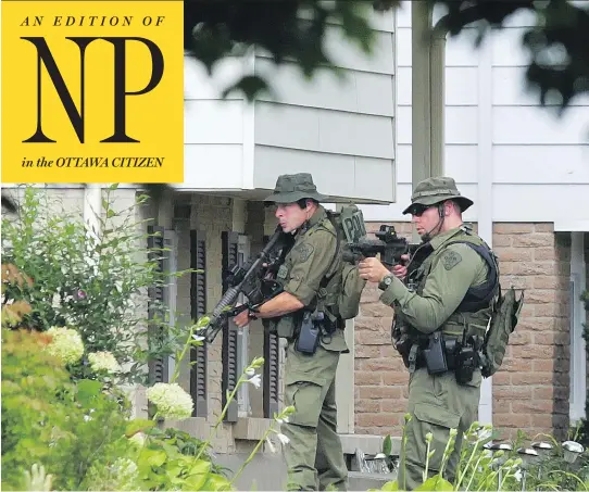  ?? DAVE CHIDLEY / THE CANADIAN PRESS ?? Police maintain a watch outside of a house in Strathroy, Ont., Thursday, a day after terrorism suspect Aaron Driver was killed in a confrontat­ion with police.