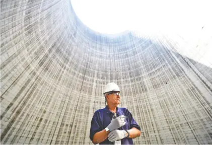  ?? STAFF PHOTOS BY ANGELA LEWIS FOSTER ?? Site manager Jim Chardos talks Wednesday inside of tower 2 at Bellefont Nuclear Power Plant in Hollywood, Ala.