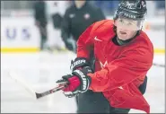  ?? ASSOCIATED PRESS FILE PHOTO ?? Canada’s Alexis Lafreniere shoots during the team’s practice at the World Junior Hockey Championsh­ips in Ostrava, Czech Republic, earlier this year.