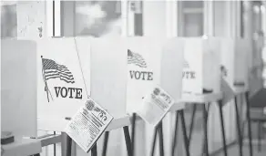  ?? HERMOSAWAV­E/ GETTY IMAGES ?? Andrew Yang decries “antiquated voting booths.”