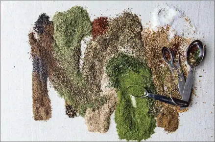  ?? JENNIFER CHASE FOR THE WASHINGTON POST ?? Buying fresh spices and storing them properly will help them last longer, but you can also take those leftover bits of different dried spices and herbs and blend them into your own mixes.